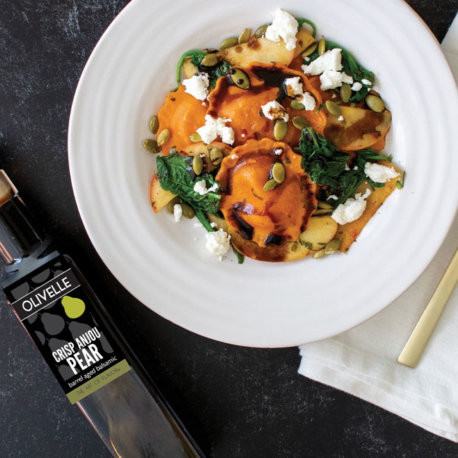 Image of Squash Ravioli With Sauteed Apples And A Pear Balsamic Drizzle