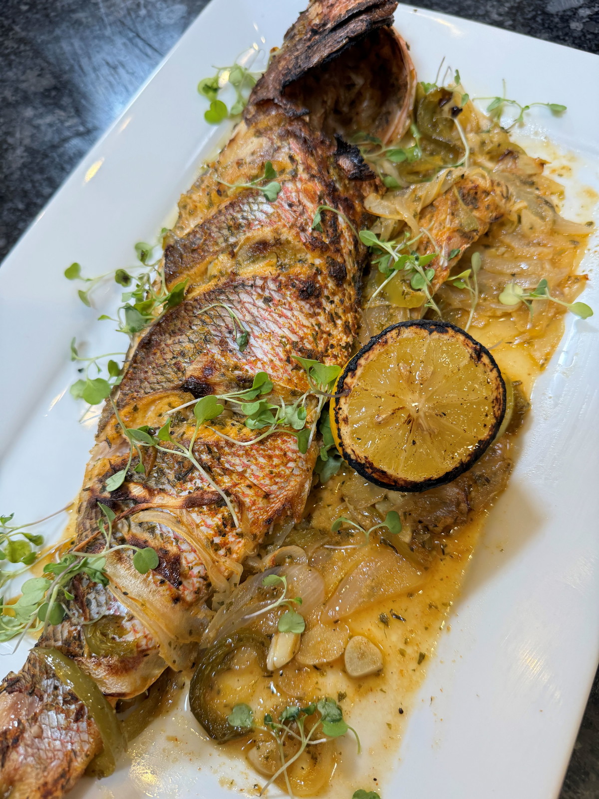 Oven-baked whole snapper 