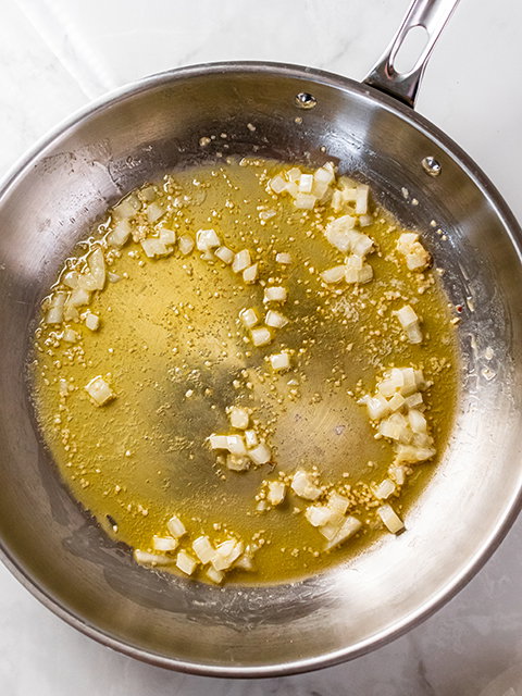 Image of In a separate skillet, heat butter over medium heat. Add...