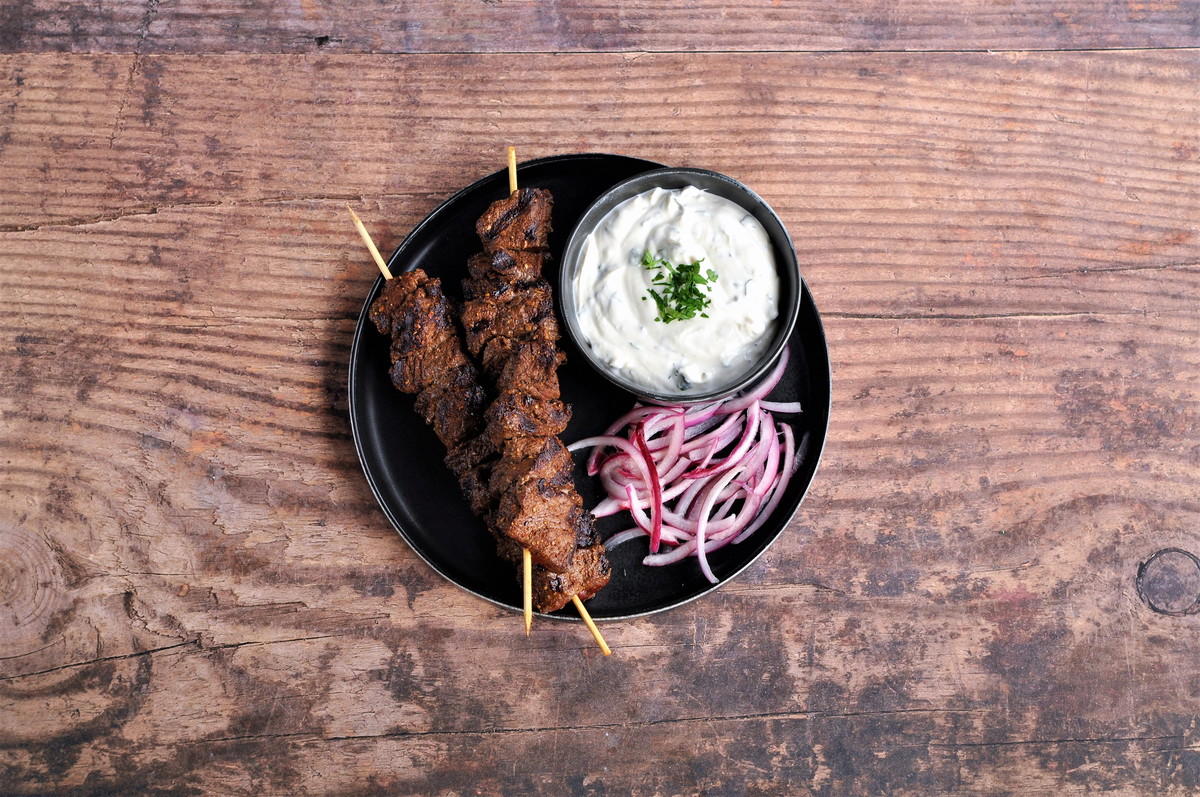 Spiced Beef Kebabs with Yogurt-Tahini Sauce and Pickled Onions