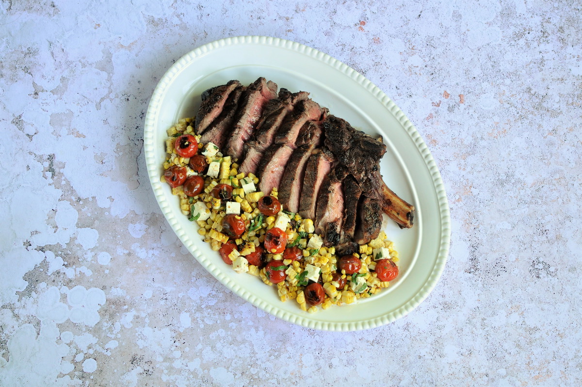 Grilled Cowboy Steak with Blistered Corn and Cherry Tomato Salad