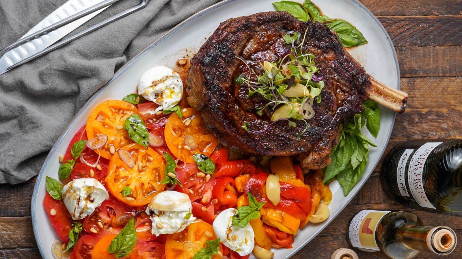 Image of Grilled Cowboy Steak and Heirloom Tomato & Burrata Salad