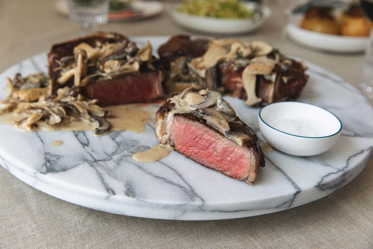 Bone-In NY Strip with Wild Mushroom Cream Steak Sauce