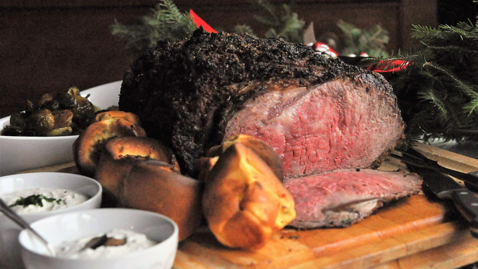 Image of Herb and Salt-Crusted Ribeye with Yorkshire Pudding and Two Sauces