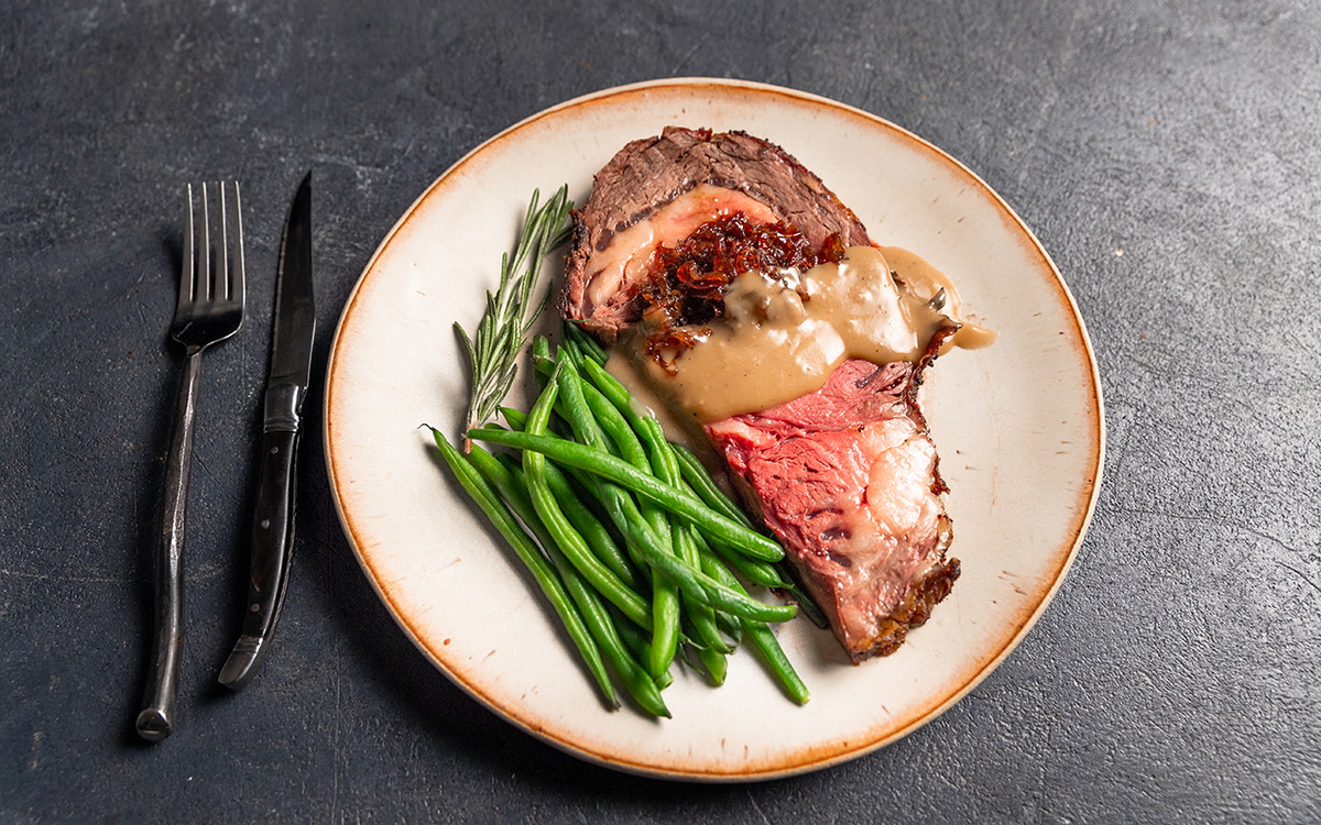 Bone-In Prime Rib with Shallot-Red Wine Jam & Black Pepper Gravy