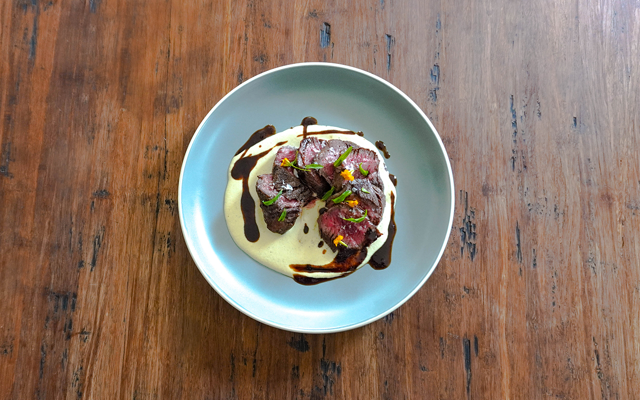 Image of American Wagyu Black® Hanger Steak with Onion Soubise and Tamarind Reduction