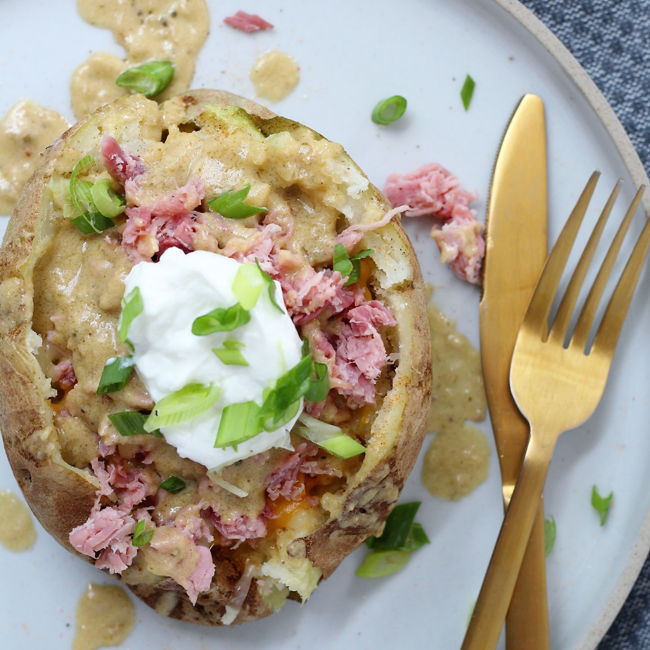 Image of Loaded Baked Potatoes with Green Peppercorn Sauce