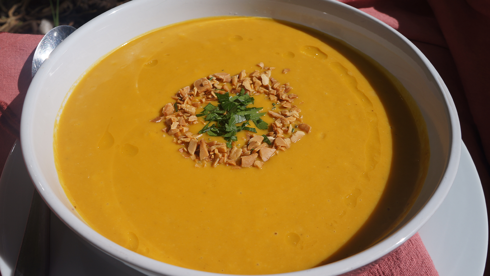 Image of  Roasted Pumpkin and Apple Soup with Herby Almond Crumble