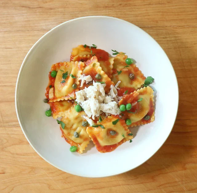 Image of Tomato Basil Ravioli with Crab and Green Peas