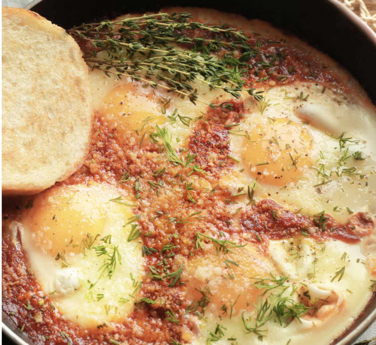 Eggs in Purgatory with Spicy Pomodoro Sauce and Toasted Crusty Baguette