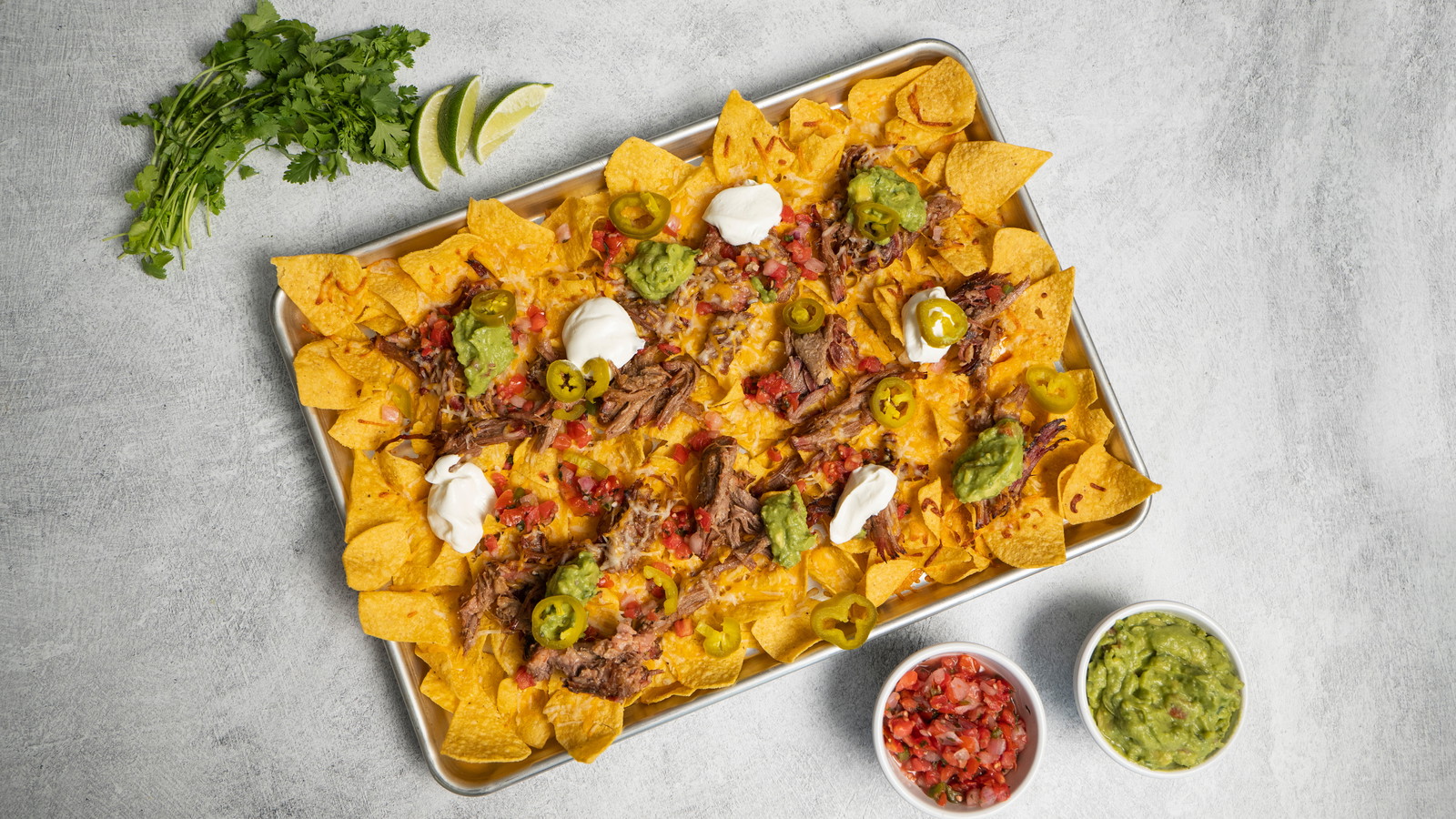 Image of Sheet Pan Smoked Pulled Pork Nachos