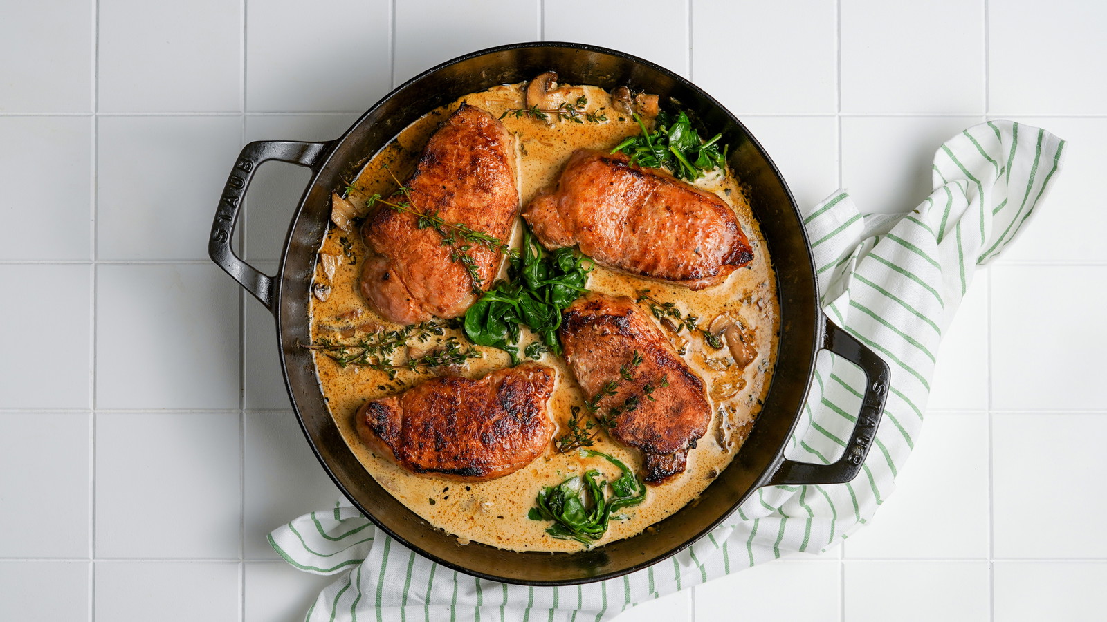 Image of Pork Chops with Mustard Cream Sauce, Mushrooms and Sautéed Spinach