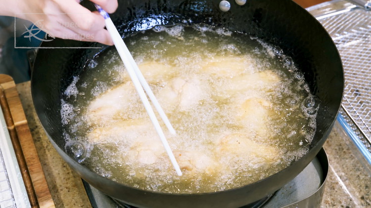 Image of Heat 2.5 cups of oil to 320F. Add the chicken wings one by one and fry for 5-6 minutes. Here is another rule that will improve your cooking skill. When deep frying, cook smaller items at higher temperatures and larger...