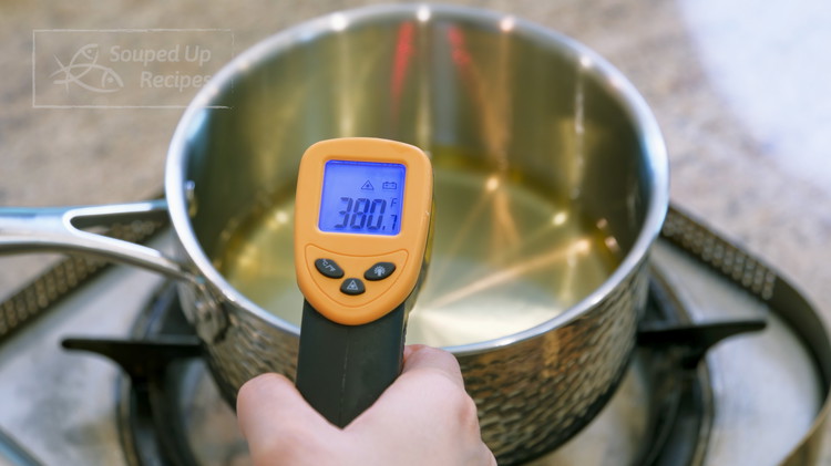 Image of Heat 1 cup oil to 380℉ / 193℃ and turn off the heat. The purpose of the heating is to remove the raw oil taste. Put on the lid and let it cool completely.