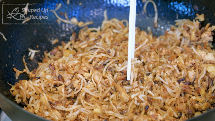 Image of Taste the filling to adjust the flavor and set it aside.