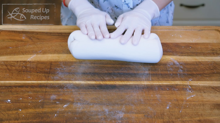 Image of Cover the flour and let it cool to lukewarm, then knead it for 5-6 minutes or until a smooth dough forms.