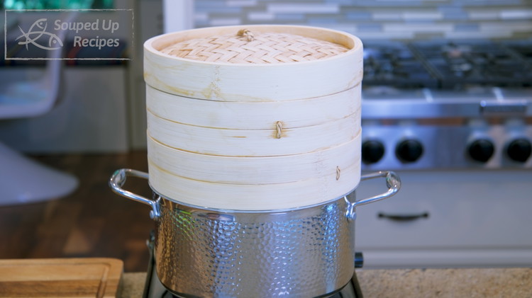 Image of Pre-boil the water in the pot. Steam the dumplings over high heat for 20 minutes.
