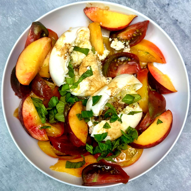 Image of peach, tomato & burrata salad