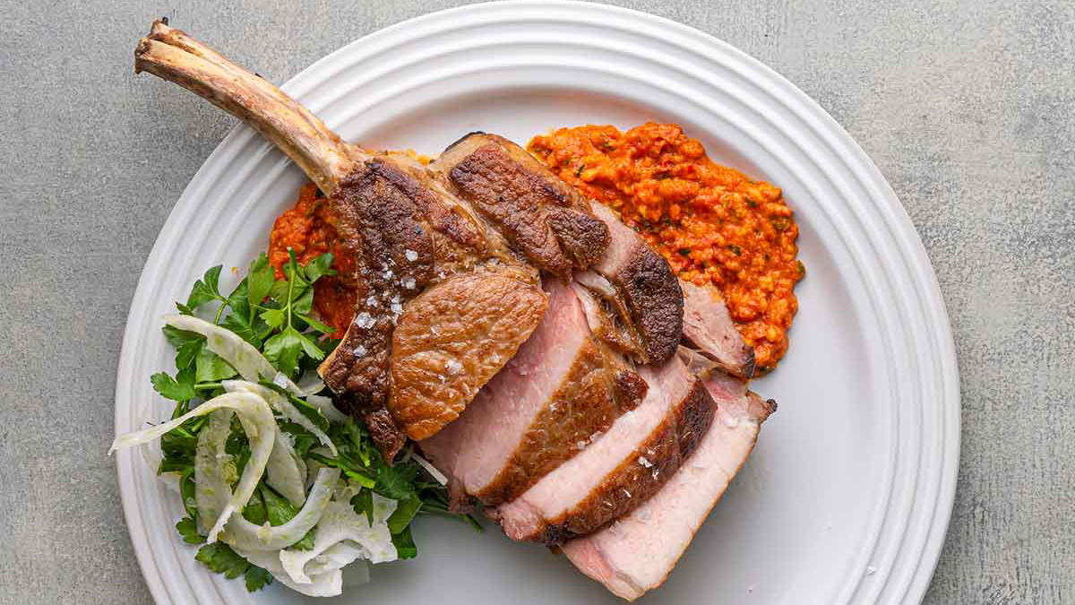 Image of Double Bone Kurobuta Pork Chops with Romesco & Fennel Salad