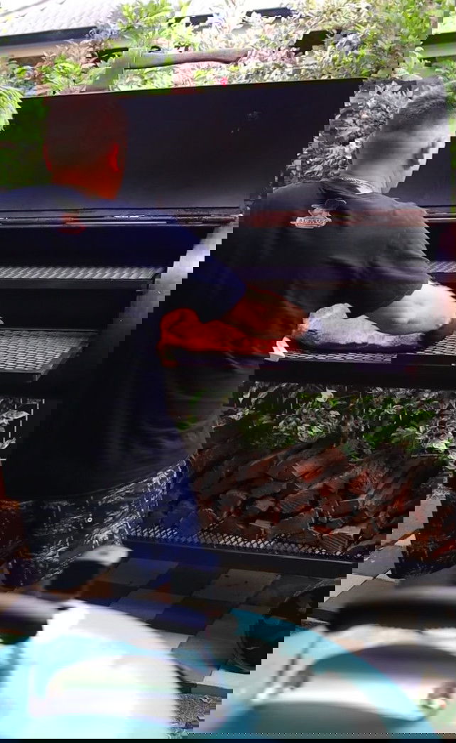 Image of Now that the smoker is preheated, you can remove the...