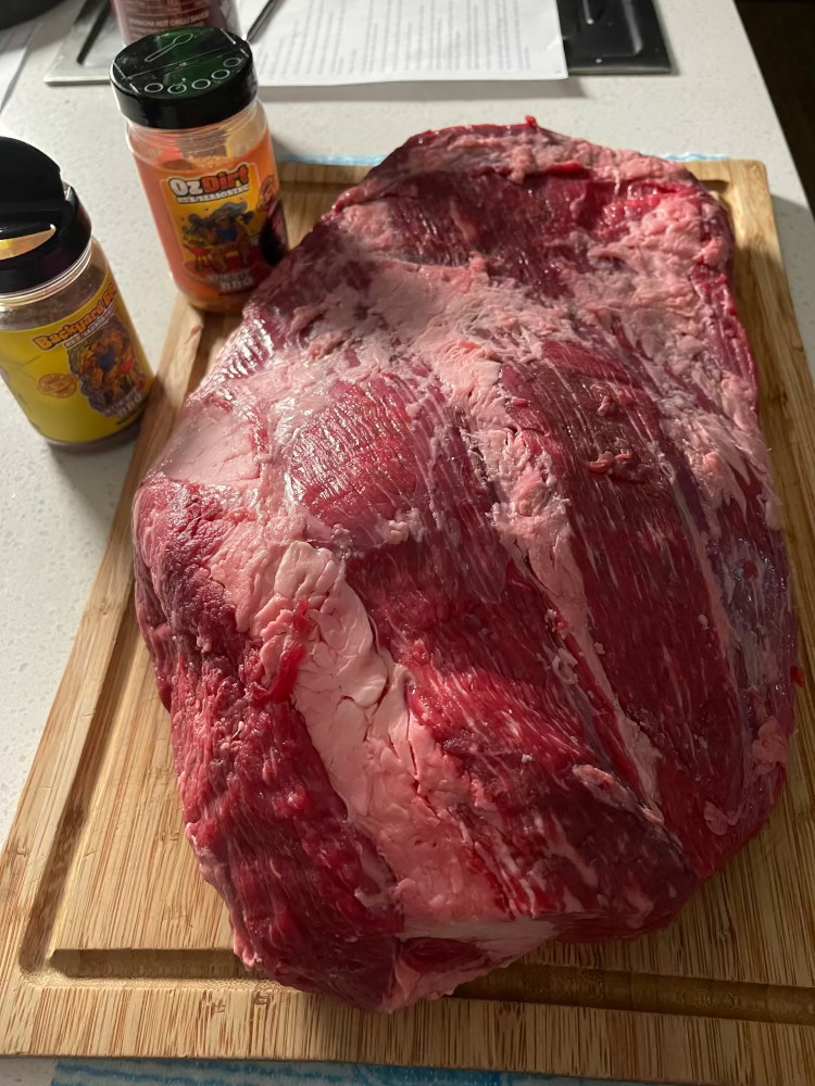 Image of To smooth out the brisket and remove all the flappy bits we want to slice down the long ends of the brisket first. From there round off both ends. Paying particular attention to the flat end so if it is...