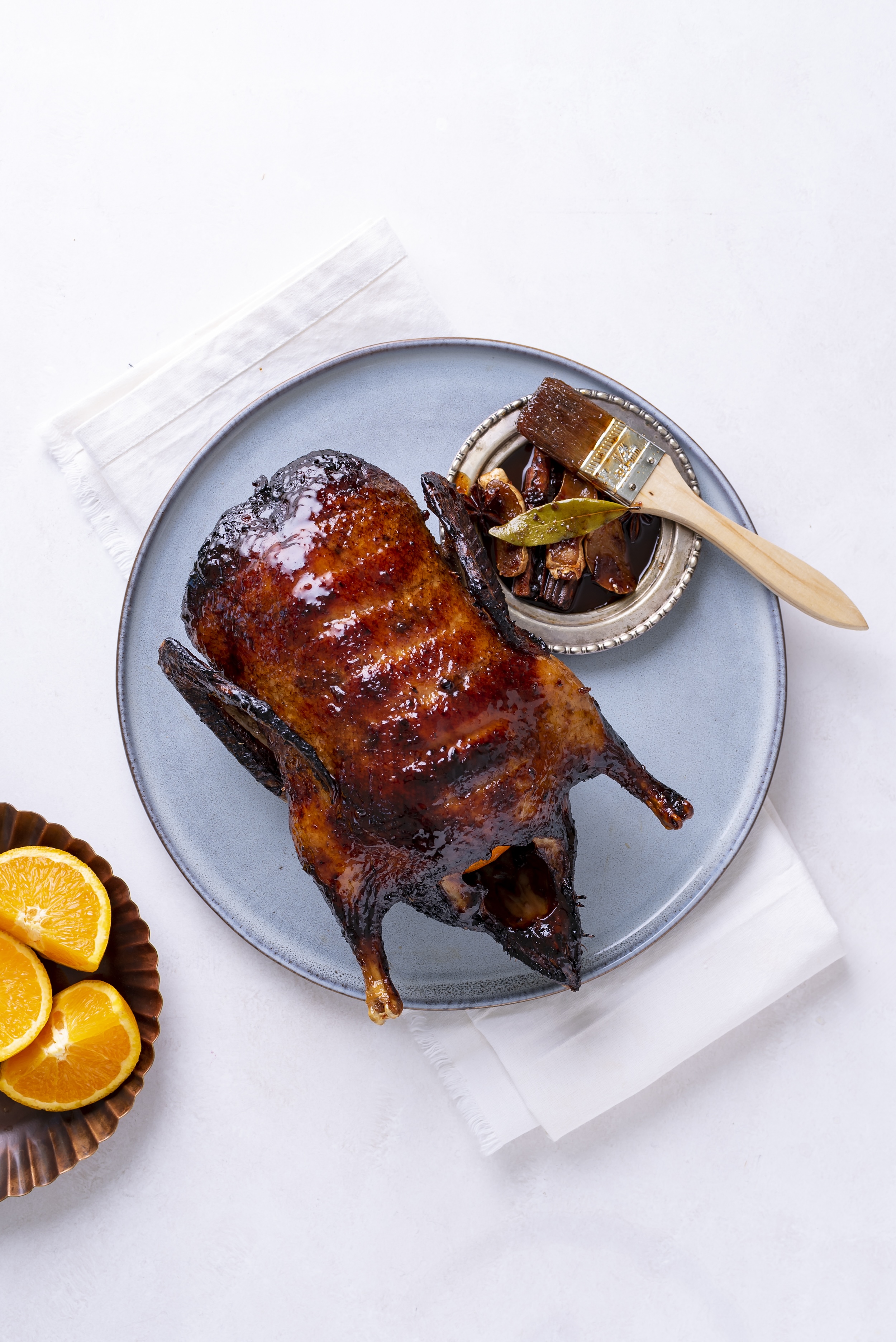 Image of Festive Roast Duck with Aged Black Garlic and Spiced Cherry Glaze