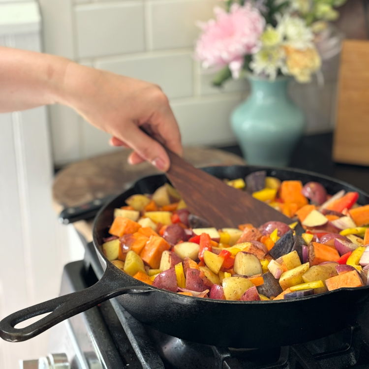 Image of Add chopped potatoes to the pan in a single layer....