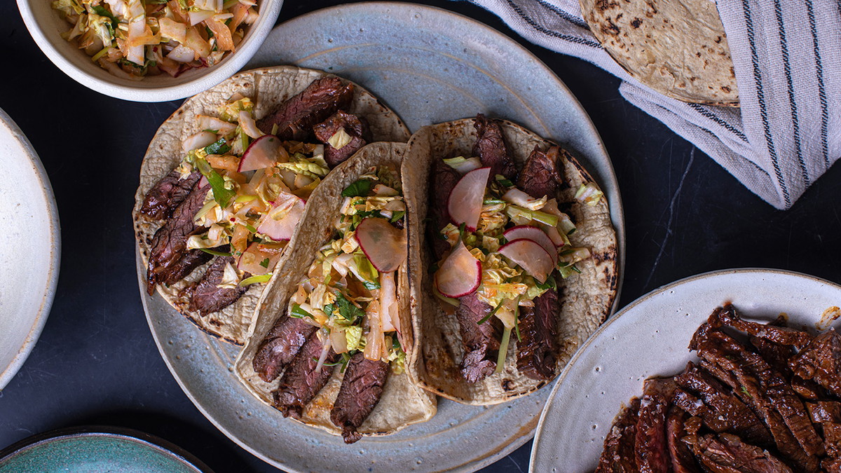 Korean Inspired Wagyu Skirt Steak Tacos with Kimchi Slaw