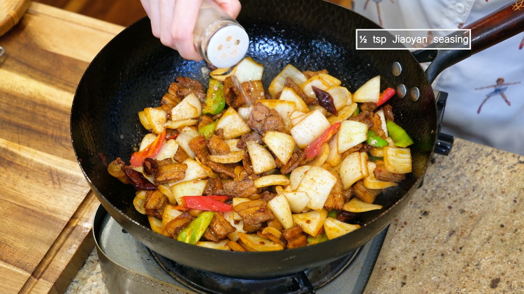 Image of Sprinkle 1/2 tsp of Jiaoyan seasoning, an all-purpose Chinese dry rub that has a complex taste and aroma, which will introduce some mystery flavors and bring this dish to the next level. You can buy Jiaoyan seasoning from the store....