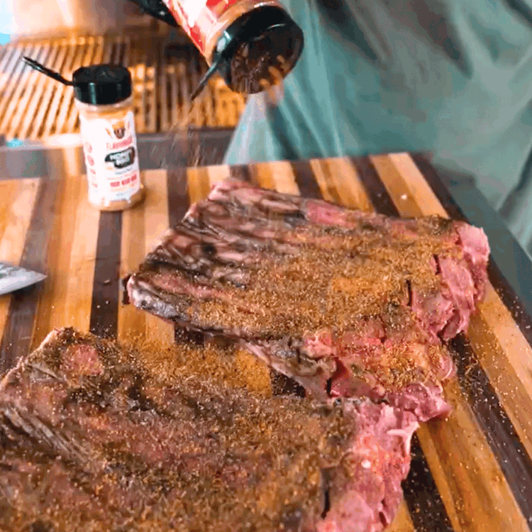 Image of Generously season with both the Flavor God Original BBQ Rub and Honey BBQ Rub. Let those flavors sink in while you fire up the grill.