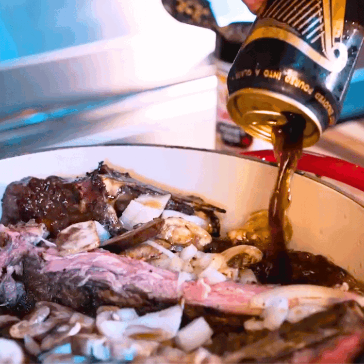Image of Place the rib pieces in a large Dutch oven along with the chopped onions, mushrooms, beef broth, and Guinness beer. Sprinkle in some extra Honey BBQ Rub for added flavor.