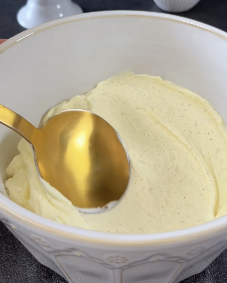 Image of Beat the soft butter and gradually fold in the cooled cream until light and fluffy. Chill the cream before using.