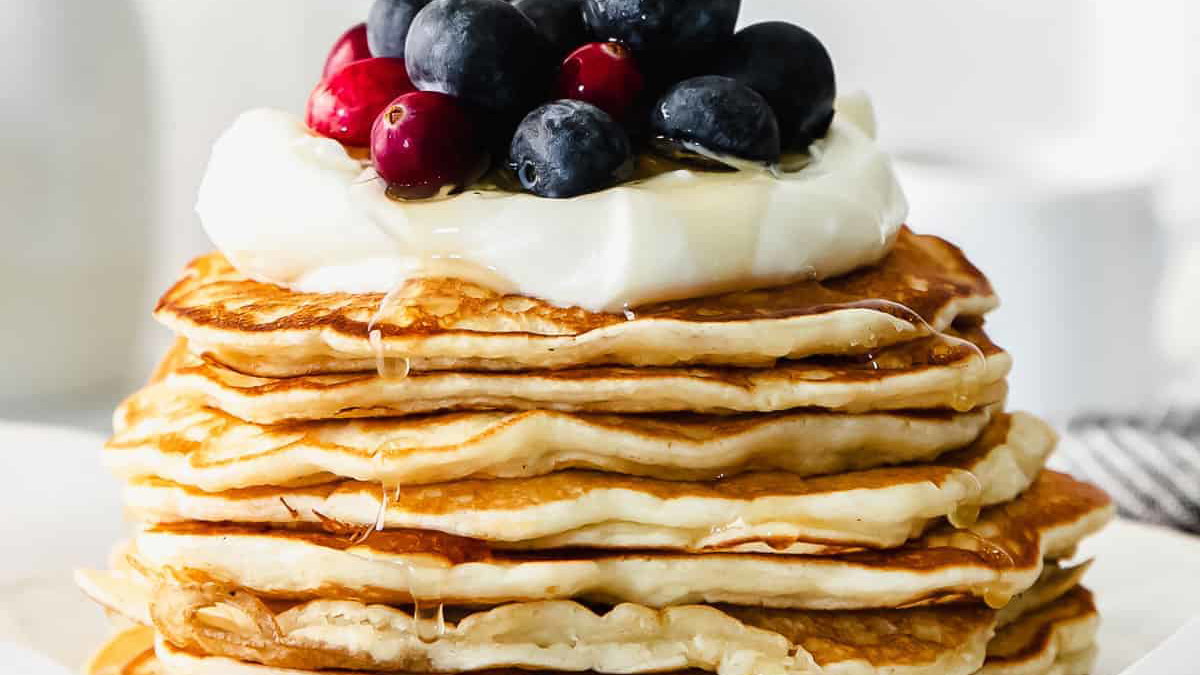 Image of Carrot Cake Pancakes with Cream Cheese Drizzle