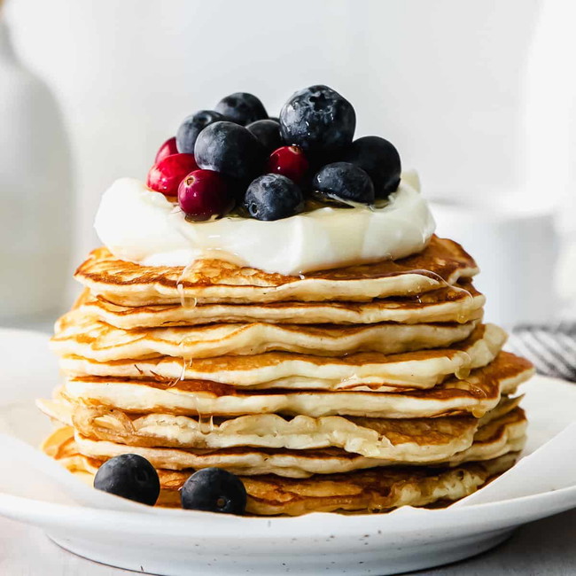Image of Carrot Cake Pancakes with Cream Cheese Drizzle