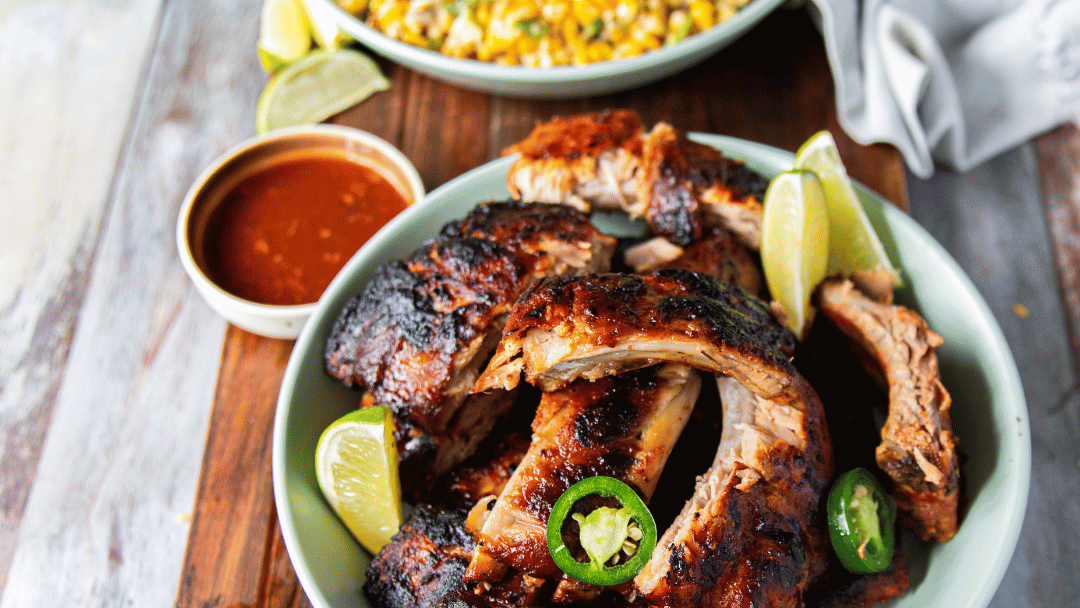 Image of Grilled Back Ribs in BBQ Sauce with Mexican Street Corn Salad