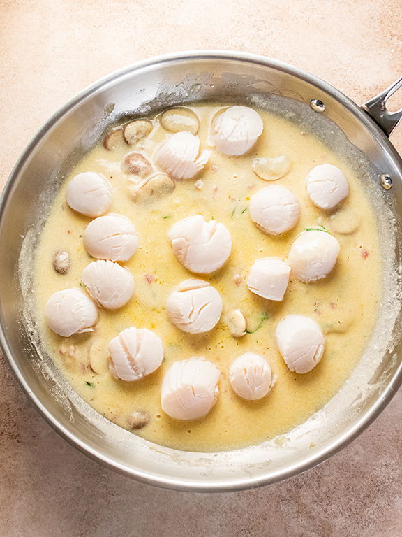 Image of Sprinkle flour over vegetables and stir. Cook 2 minutes longer....