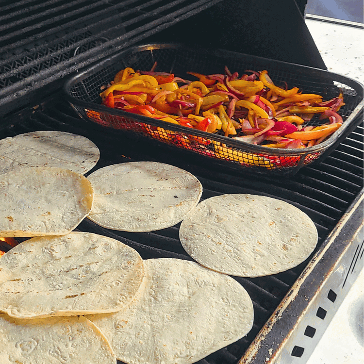 Image of Just before the veggies are done you can heat the tortillas over low heat on the grill.