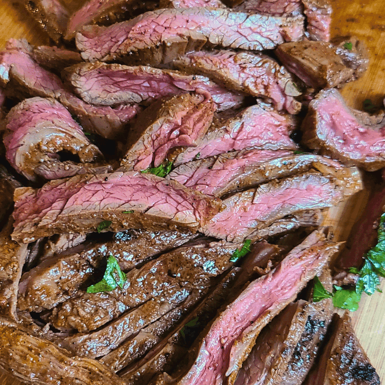 Image of Slice the rested bison skirt steak against the grain into thin slices. For tender and thin slices, cut at an angle.