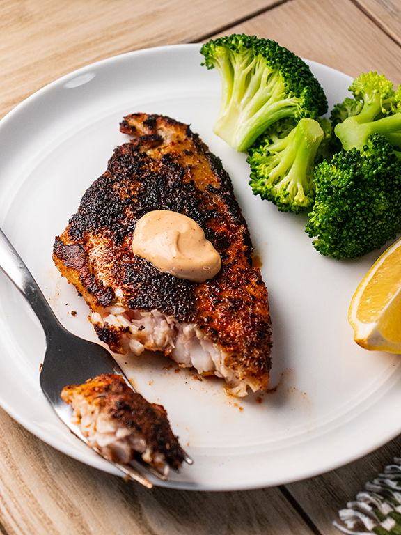 Image of Stir together ingredients for remoulade if using and serve catfish...