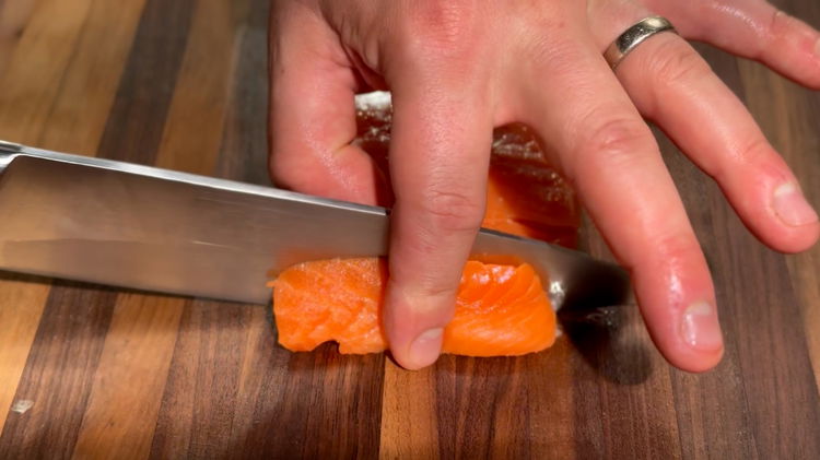 Image of Slice the Salmon: Cut the salmon into relatively thick slices,...