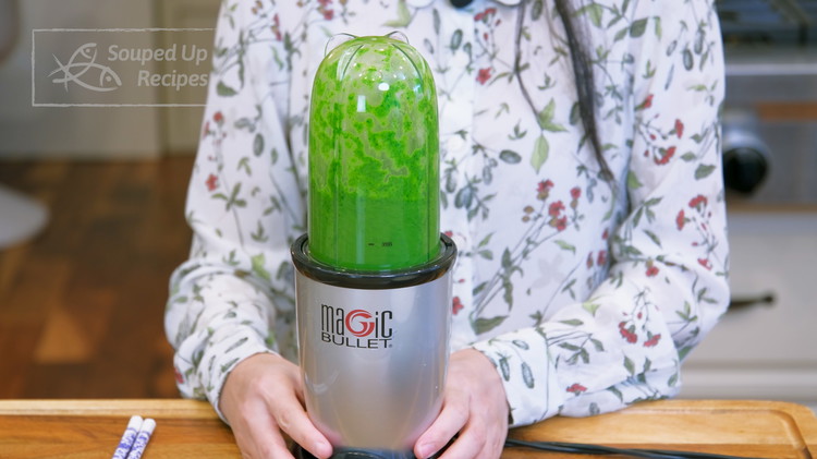Image of Transfer the cilantro into a blender cup and add water until it weighs about 175 grams. Then add 1/2 tsp of salt. Blend the cilantro, water, and salt into a puree.