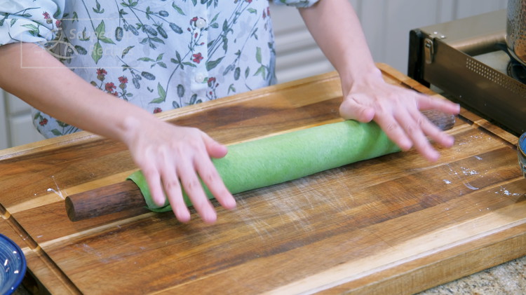 Image of Once the dough is rested for 1 hour, it should be more elastic and playable. Next, roll it into a super thin sheet. Flatten the dough ball into a round patty. Once the patty is big enough, use it to...