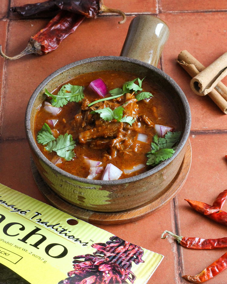 Image of Cook the Birria. In the same pot, reduce the heat...