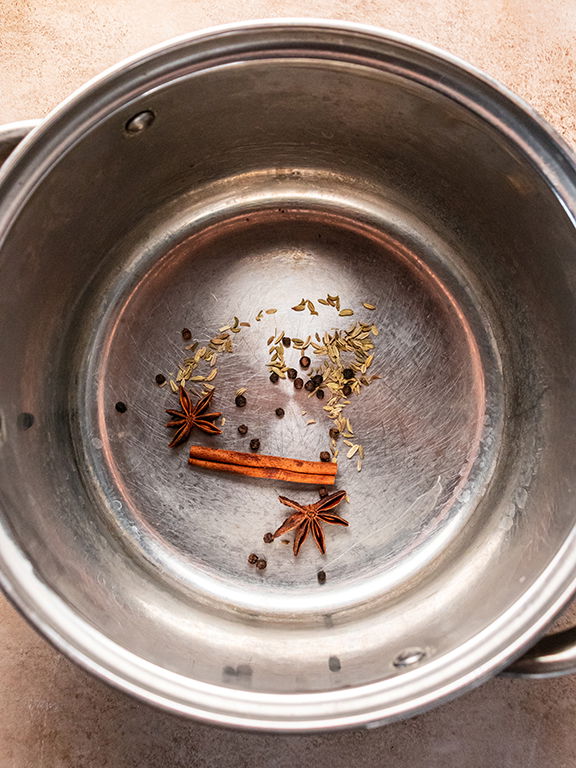 Image of Add cinnamon stick, fennel seeds, star anise and peppercorns. Toast...