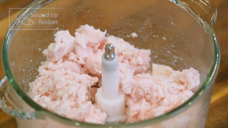 Image of Add the pork fat into a food processor and chop roughly because smaller pieces allow the fat to render faster. However, do not chop too fine. You still want to see some little bites of fat; otherwise, the lard will...
