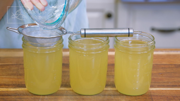 Image of Once done, you should have a full banking pan of pork lard. For your reference, 4 pounds of pork fat gets about 3 pounds of lard, which fills 3 16-oz mason jars perfectly. Pour everything through a sieve to eliminate...