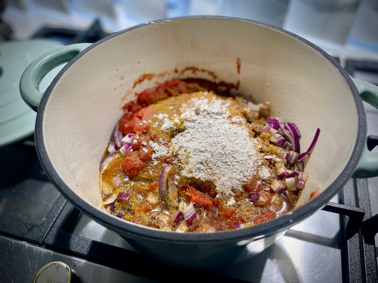 Image of Whilst beef is cranking, neck some tins and prep up all your veg and throw everything including the spices into a crock pot (hold corn starch slurry). No heat at this stage.