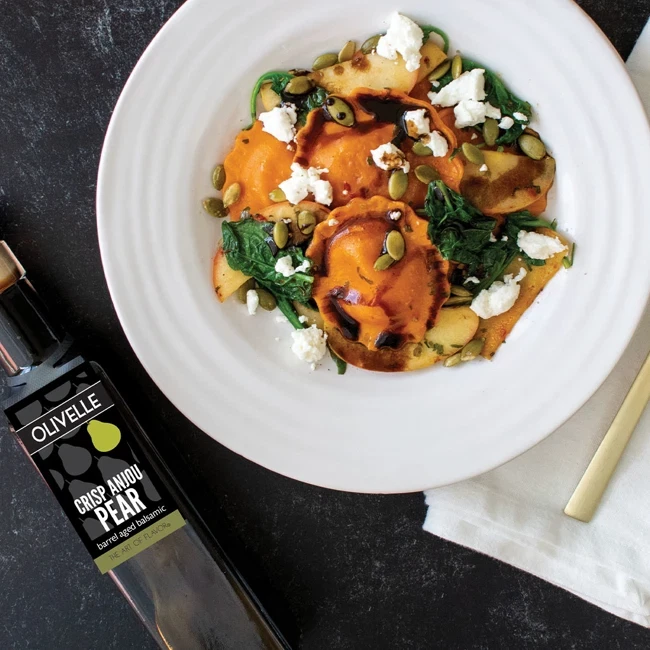 Squash Ravioli With Sauteed Apples And A Pear Balsamic Drizzle