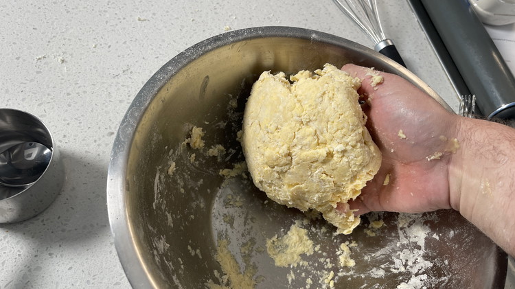 Image of Knead dough 3-4 times until you can form a dough ball that doesn’t fall apart