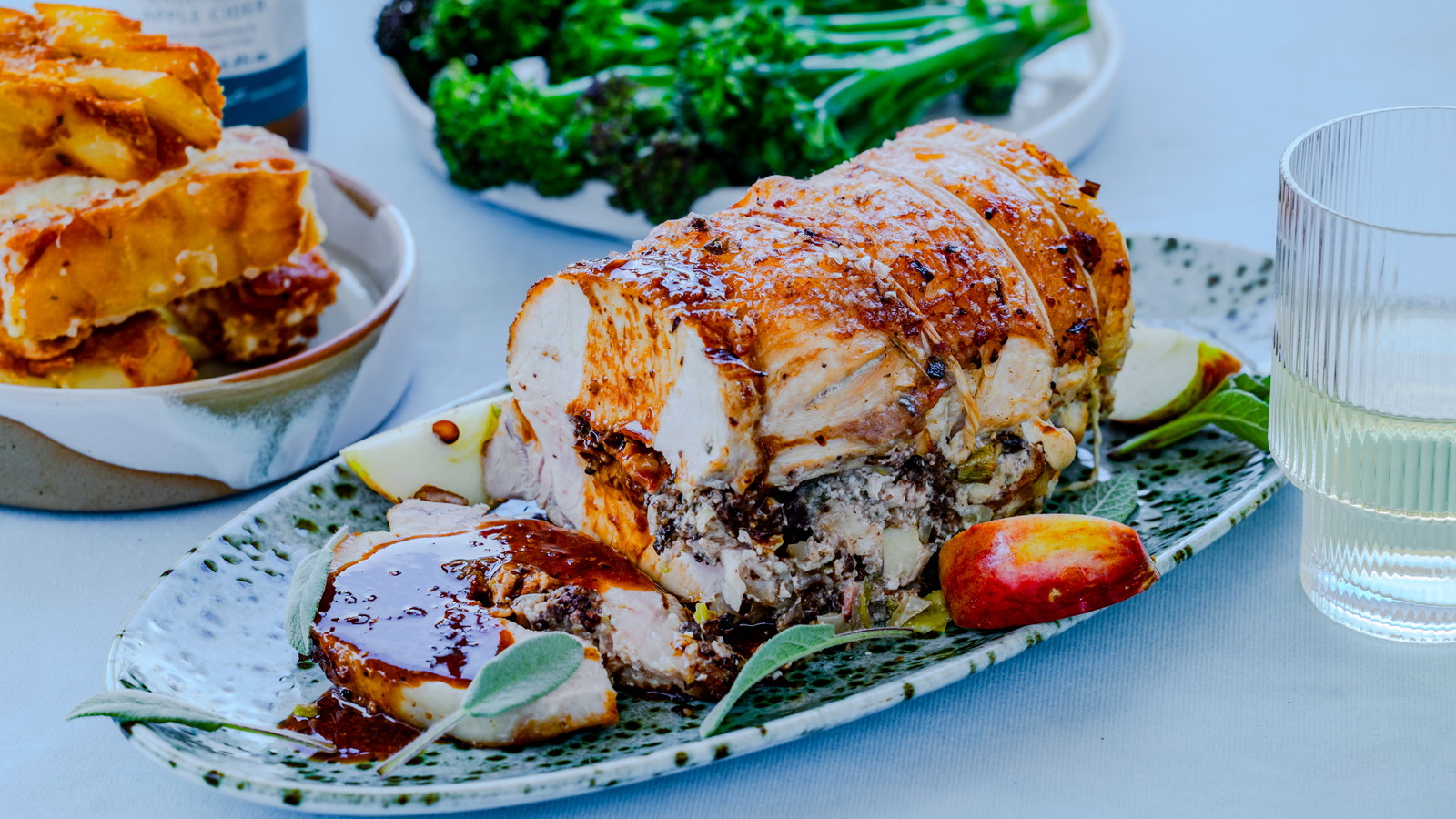 Image of Black Pudding and Bacon Stuffed Pork Loin with Cider Sauce and Confit Potatoes